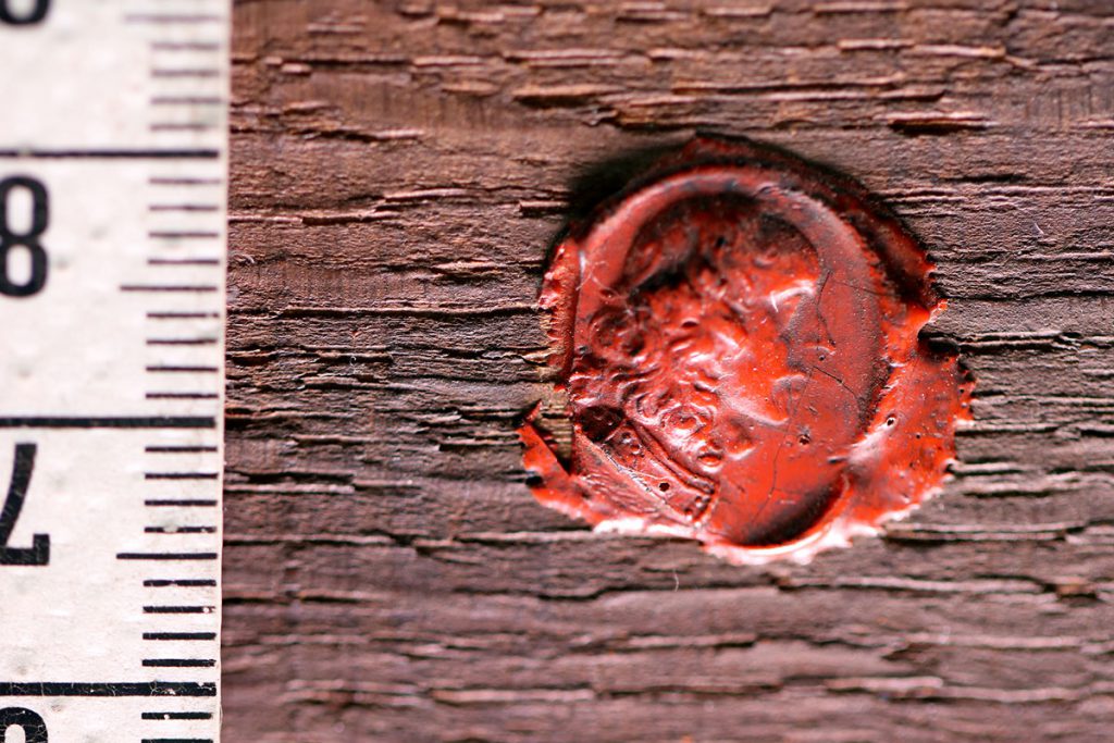 Wax seal on the reverse of the panel